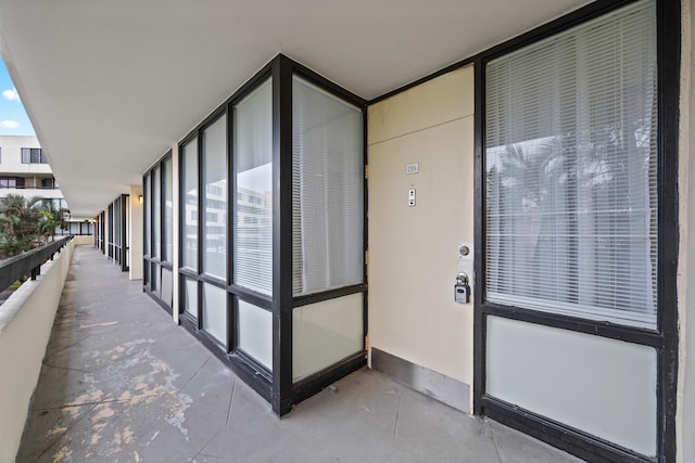 entrance to property with a balcony