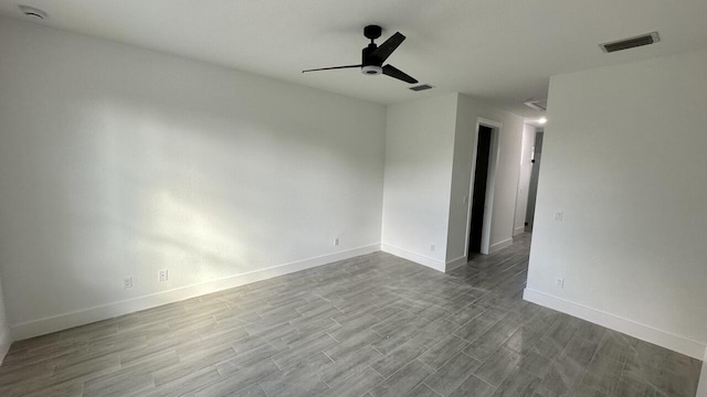 spare room with ceiling fan