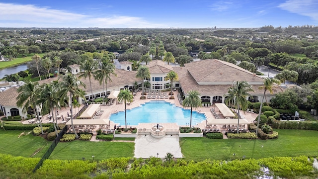 view of swimming pool featuring a water view