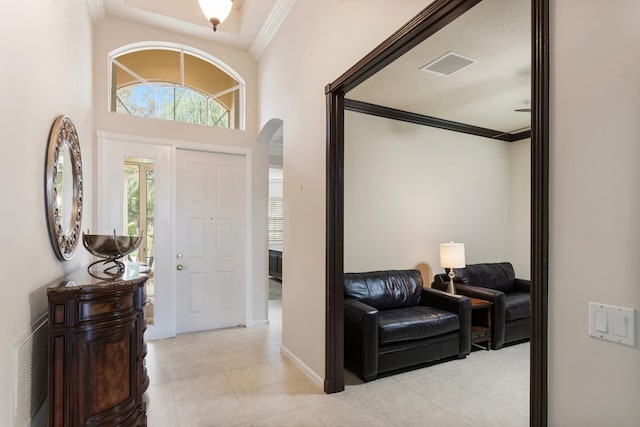 entryway with crown molding