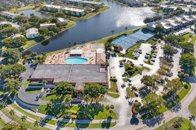 birds eye view of property featuring a water view