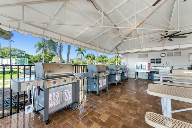 view of patio / terrace featuring ceiling fan and a grill