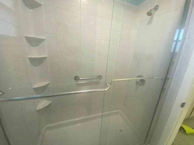 bathroom featuring walk in shower