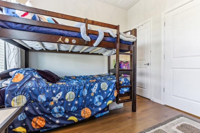 bedroom featuring dark wood-type flooring