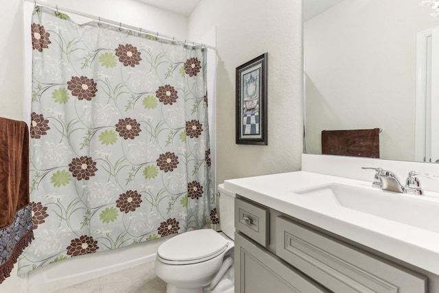 full bathroom featuring vanity, shower / bath combo, and toilet