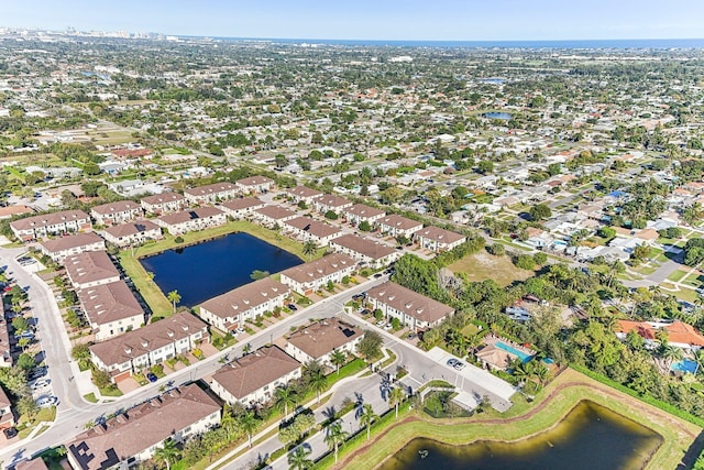 bird's eye view with a water view