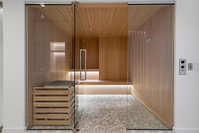 view of sauna / steam room with tile patterned flooring