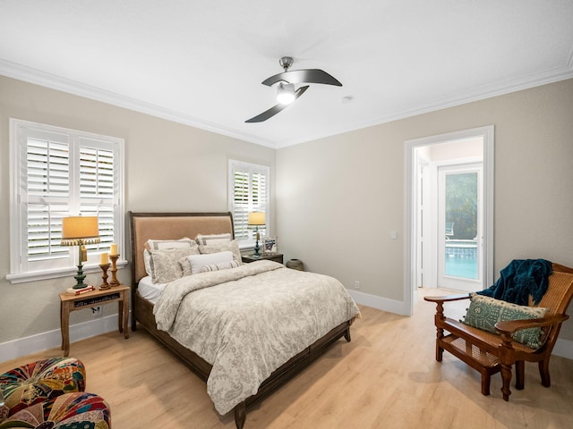 bedroom with multiple windows, ceiling fan, light hardwood / wood-style flooring, and crown molding