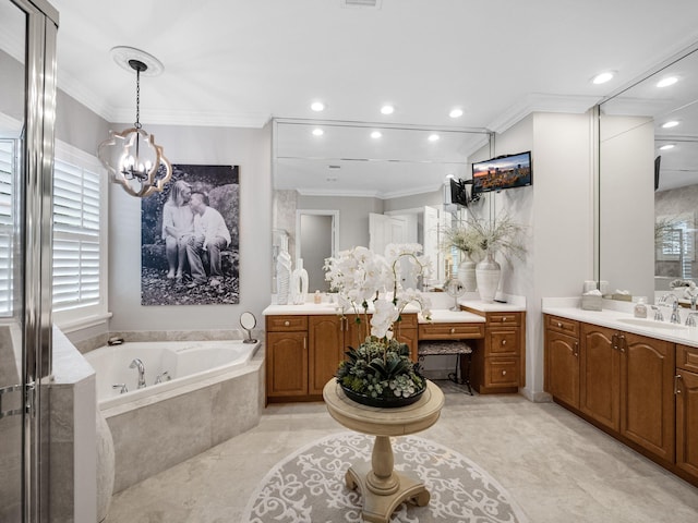 bathroom featuring vanity, crown molding, tiled tub, and a chandelier