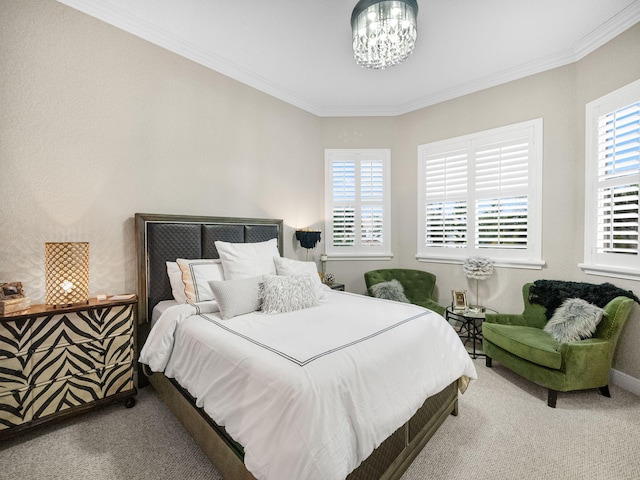 bedroom with multiple windows, carpet, and a notable chandelier