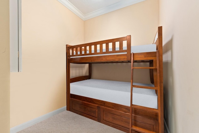 unfurnished bedroom featuring carpet and crown molding