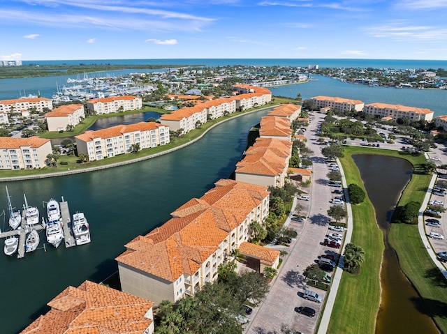 drone / aerial view with a water view