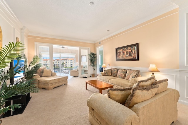 living room with light colored carpet and crown molding