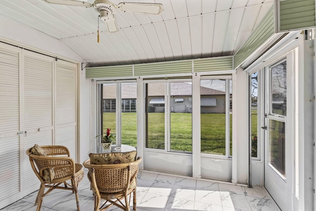 sunroom / solarium featuring wooden ceiling and lofted ceiling