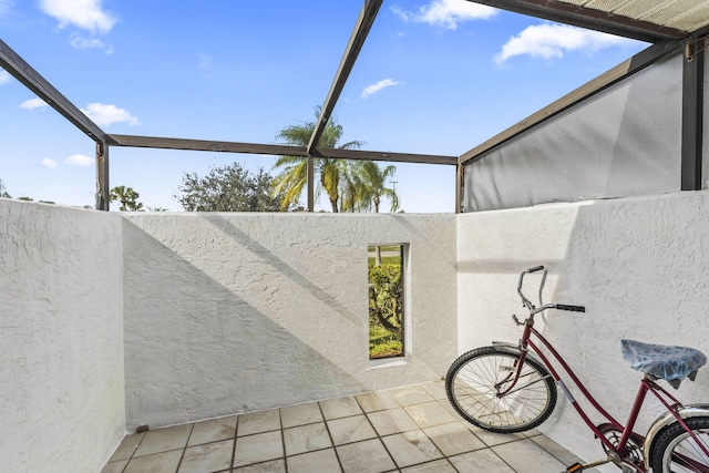 view of patio / terrace with a lanai