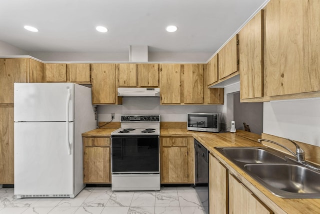 kitchen featuring sink and white appliances