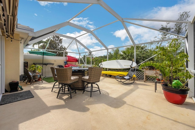 view of patio with a lanai