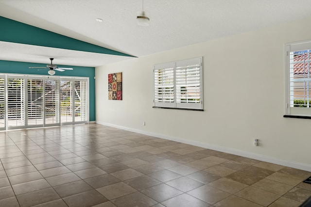 unfurnished room featuring lofted ceiling and ceiling fan