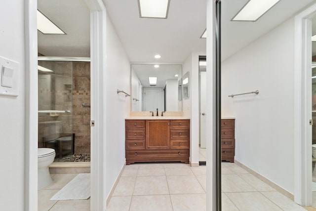 bathroom featuring tile patterned flooring and toilet