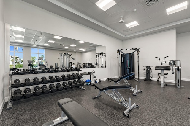 exercise room featuring a paneled ceiling