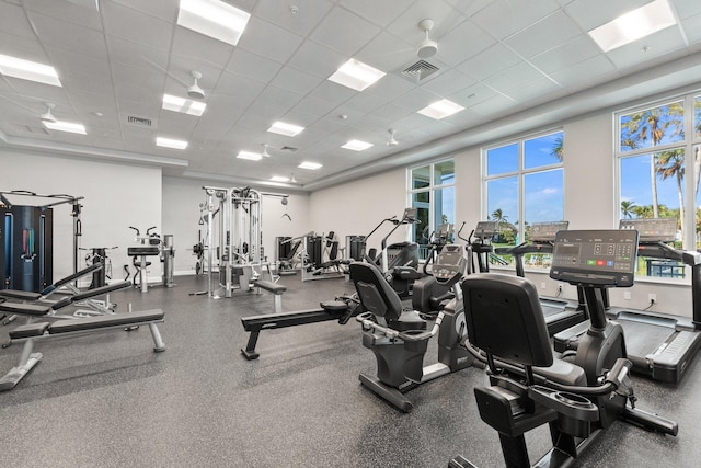 gym featuring a paneled ceiling