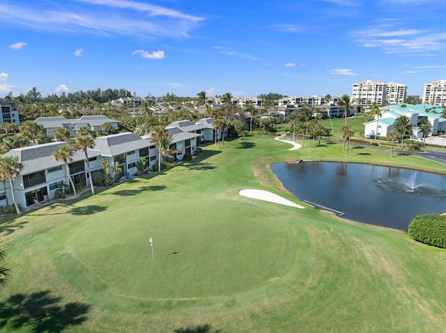 view of community with a water view