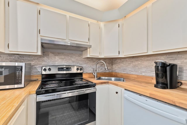 kitchen with white cabinetry, sink, backsplash, white dishwasher, and stainless steel range with electric cooktop