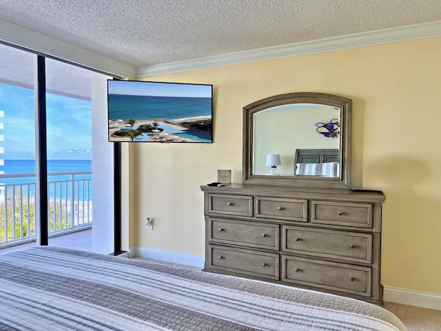 bedroom with light carpet, a textured ceiling, a water view, and crown molding