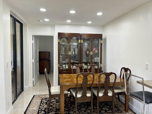 dining room featuring light tile patterned floors