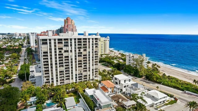 aerial view featuring a water view and a beach view