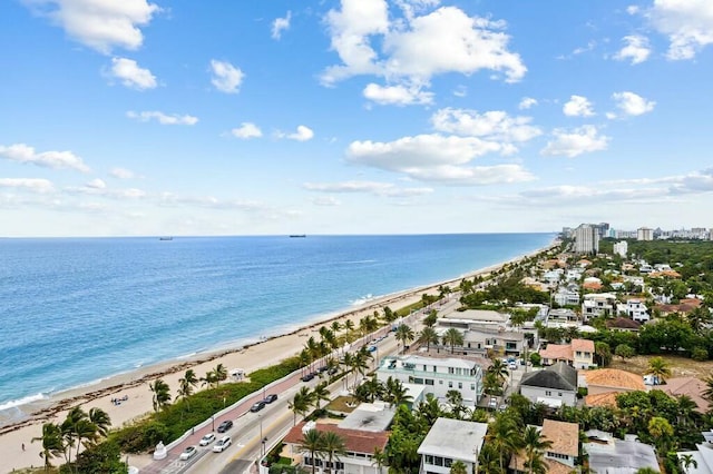 bird's eye view featuring a beach view and a water view