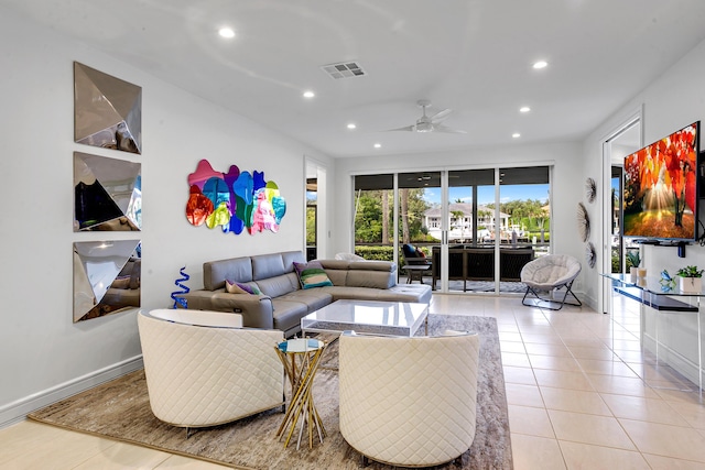 tiled living room featuring ceiling fan