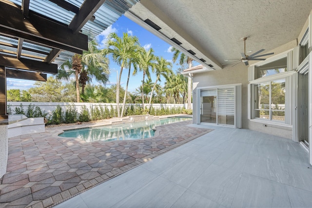 view of pool featuring ceiling fan and a patio area