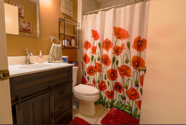 bathroom with toilet, vanity, tile patterned floors, and curtained shower