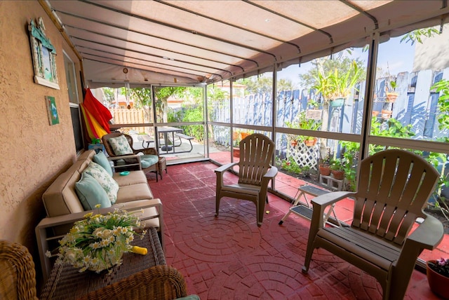 sunroom / solarium with a wealth of natural light