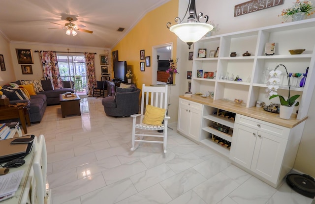 living room featuring lofted ceiling, ceiling fan, and crown molding