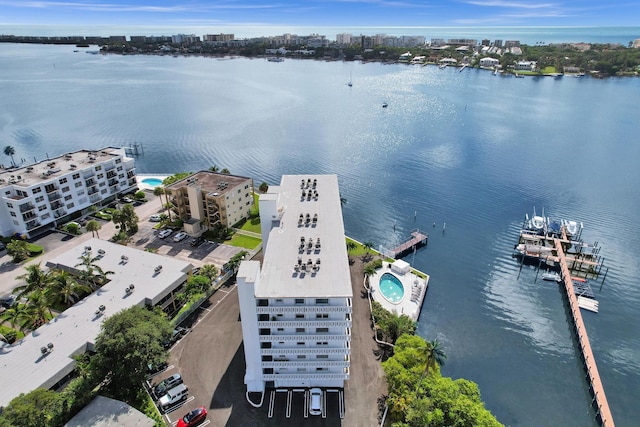 birds eye view of property featuring a water view