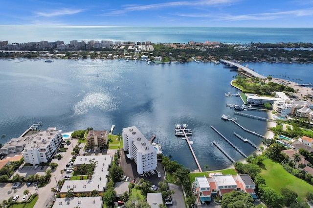 birds eye view of property featuring a water view