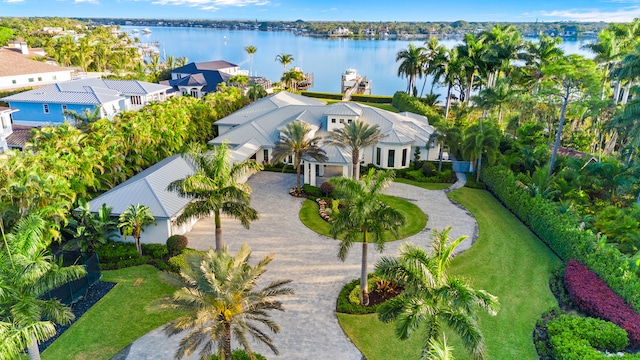 birds eye view of property featuring a water view