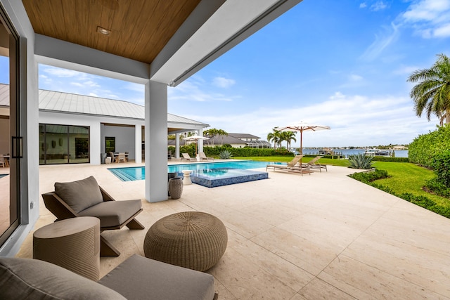 view of pool featuring a patio