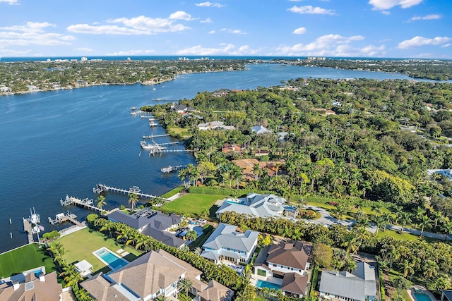 birds eye view of property featuring a water view