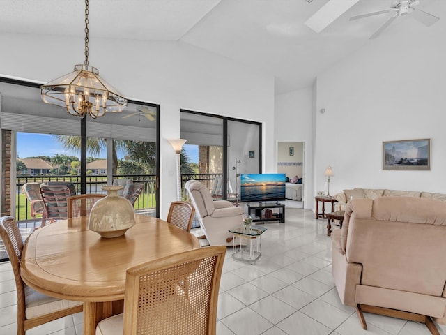 sunroom / solarium featuring ceiling fan