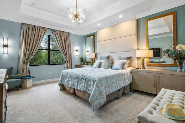 bedroom with an inviting chandelier, a tray ceiling, ornamental molding, and light colored carpet