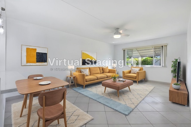 living room with light tile patterned floors and ceiling fan