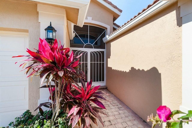 property entrance featuring a garage