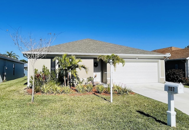 ranch-style home with a garage and a front yard