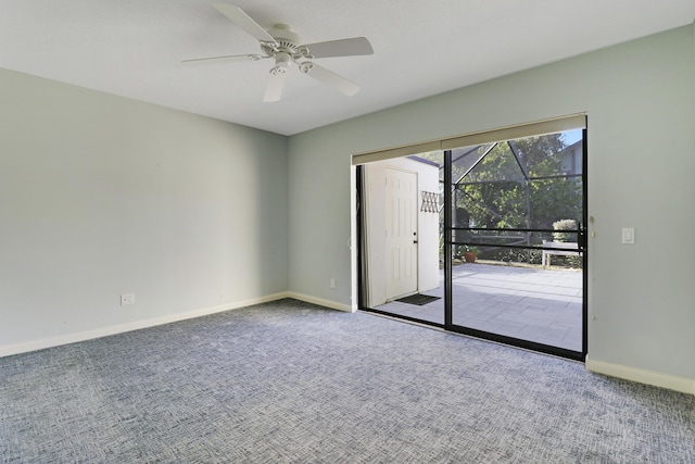 carpeted empty room with ceiling fan