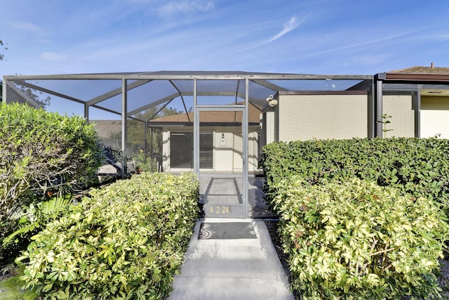 view of patio with a lanai