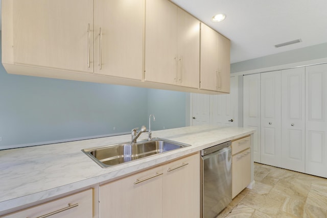 kitchen featuring stainless steel dishwasher and sink