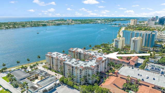 birds eye view of property featuring a water view